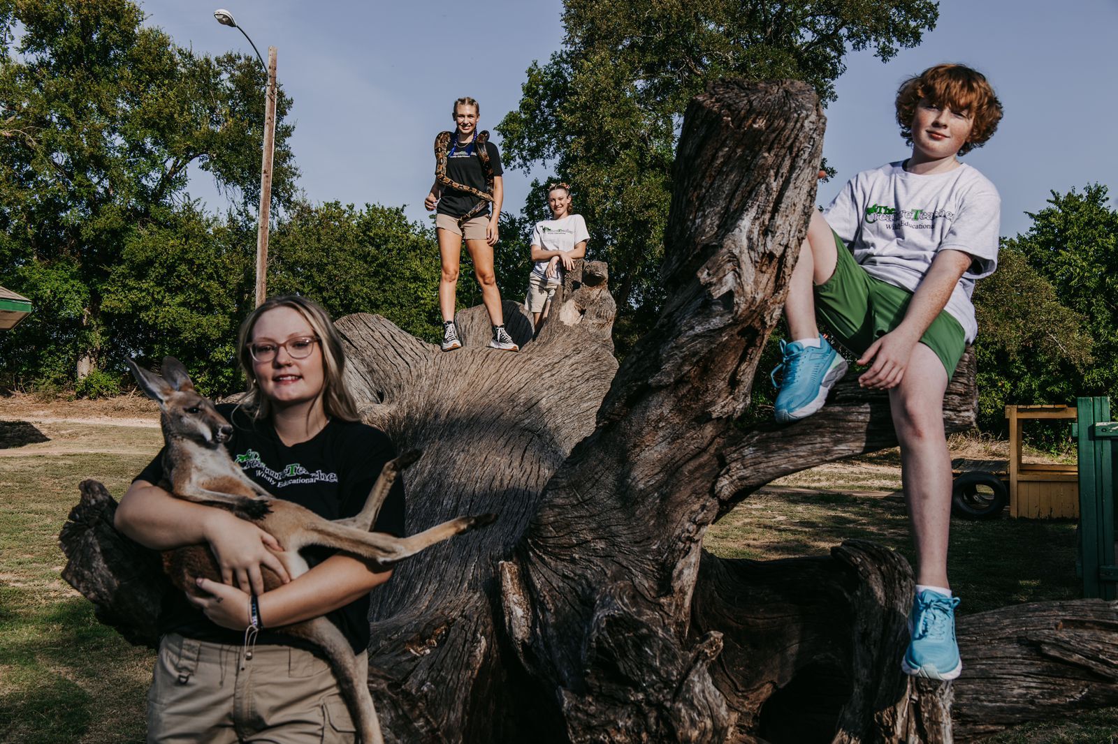 The Creature Teacher interns sitting in a tree