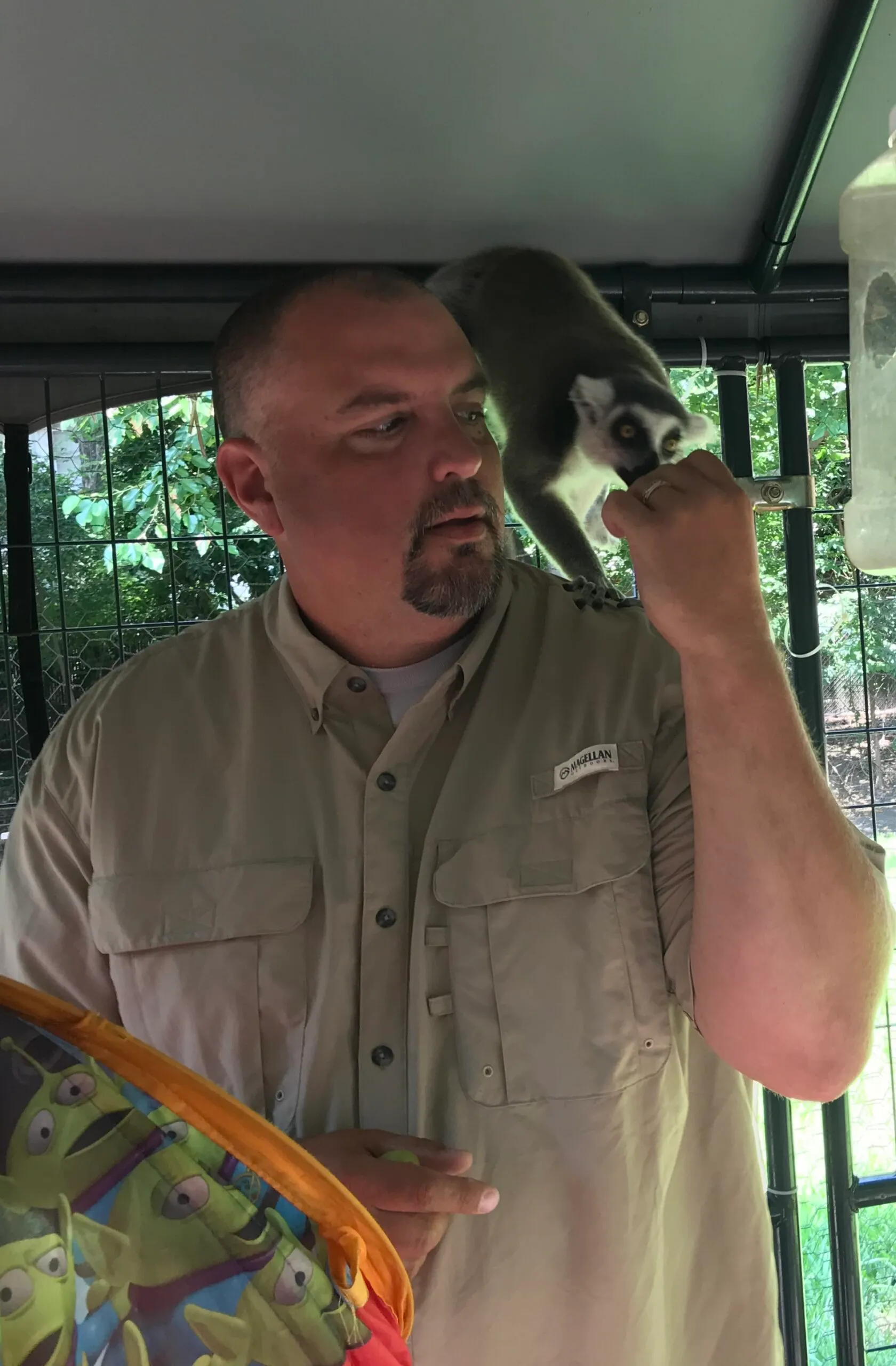 Zookeeper Aaron with a lemur